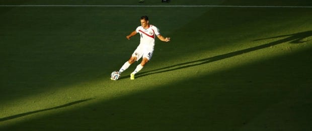 costa-ricas-michael-umana-dribbles-the-ball-in-a-game-against-uruguay