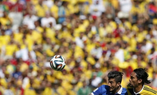 greeces-panagiotis-kone-and-colombias-abel-aguilar-fight-for-the-ball