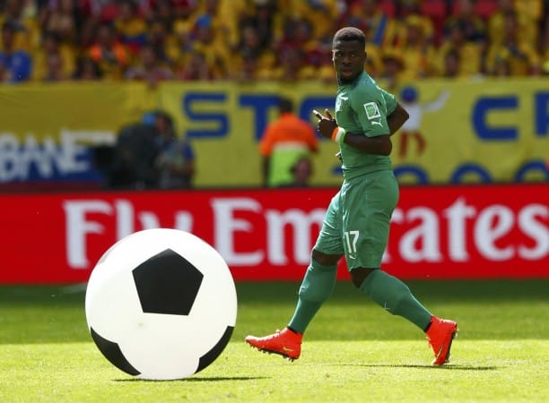ivory-coasts-serge-aurier-runs-toward-an-inflatable-ball-a-fan-got-onto-the-pitch