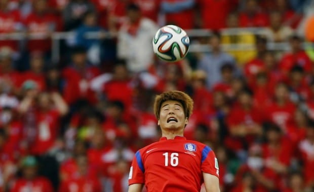 ki-sung-yueng-of-south-korea-heads-the-ball