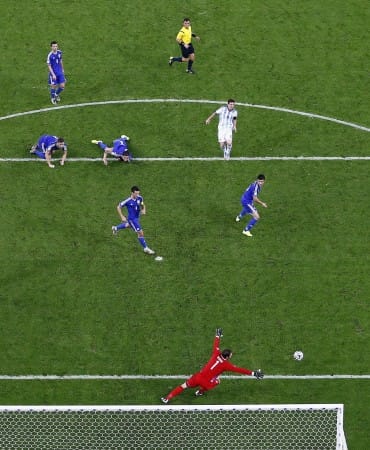 lionel-messi-scores-a-beautiful-goal-surrounded-by-five-defenders