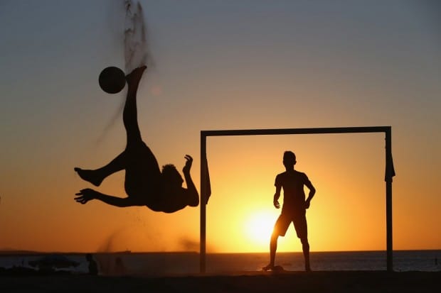 locals-play-soccer-at-sunset-on-a-beach-in-fortaleza-brazil