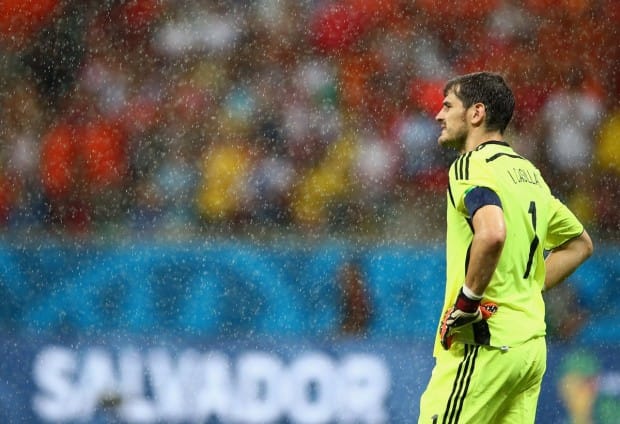 spains-goalie-iker-casillas-looks-on-as-the-rain-pours